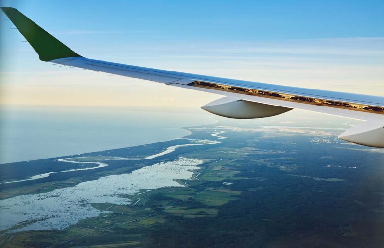 View from airplane window of a coastline