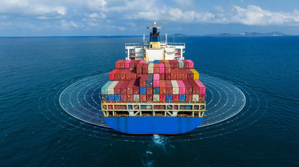 Shipping container at sea with data concept for measuring vessel performance